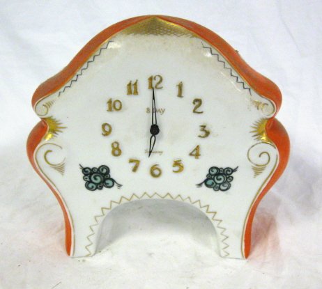 CLOCK; 8 DAY GERMAN ORANGE DECORATED SHELF CLOCK;: CLOCK; 8 DAY GERMAN ORANGE DECORATED SHELF CLOCK; ALL CLOCKS SOLD AS IS/AS FOUND. WORKING CONDITION IS UNKNOWN, POSSIBLY MISSING PENDULUM, WEIGHTS, PIECES, PARTS AND/OR KEYS