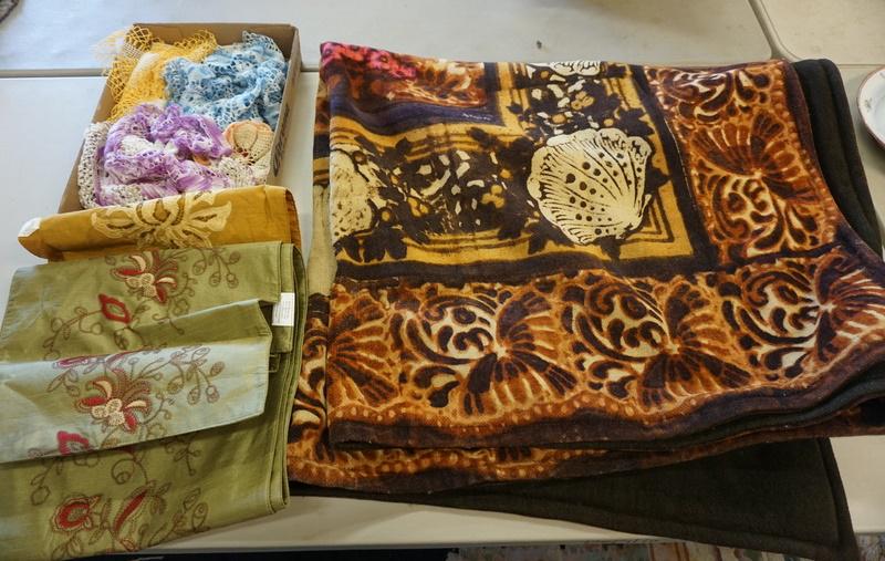 TEXTILE LOT: TEXTILE LOT, LAP ROBE, TABLE SCARVES AND DOILIES