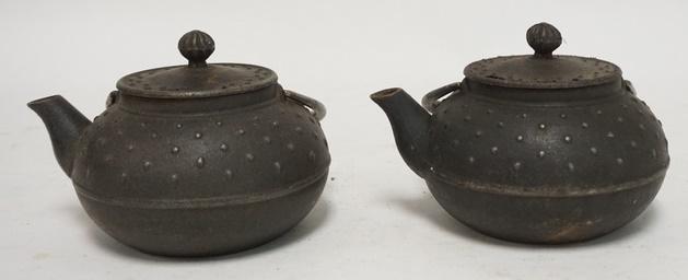 PR OF ASIAN CAST IRON TEAPOTS: PAIR OF ASIAN CAST IRON TEAPOTS CHARACTER SIGNED, 4 1/4 IN H