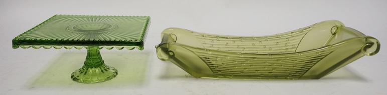 2 PCS OF GREEN GLASS: 2 PIECES OF GREEN GLASS, A 7 3/4 IN SQUARE CAKE STAND & A 15 IN BOAT SHAPED BOWL W/ SATIN FINISH PANEL GROUND BASE