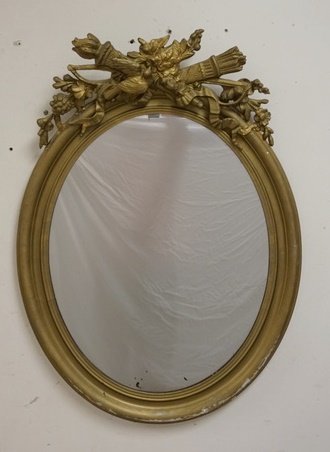 OVAL MIRROR WITH QUIVER AND TORCH CREST: OVAL MIRRO WITH QUIVER AND TORCH CREST, 27 1/2 IN X 39 IN