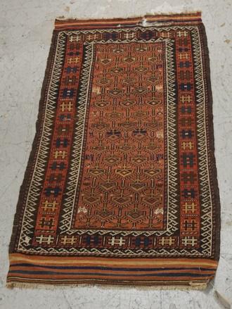 ORIENTAL THROW RUG: ORIENTAL THROW RUG HAS A TORN EDGE, 5 FT 10 IN X 3 FT