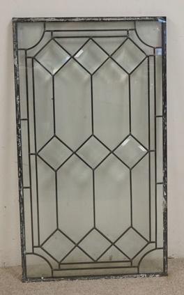 LEADED GLASS WINDOW: LEADED GLASS WINDOW ENCASED IN TWO PIECES OF GLASS & THE DIAMOND SHAPED INSERTS ARE BEVELED, 20 IN X 36 IN , 1 IN THICK