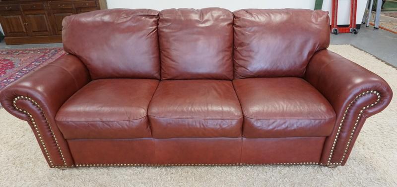 BROWN LEATHER SOFA: BROWN LEATHER SOFA. 80 IN WIDE