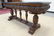 HEAVILY CARVED SOFA TABLE WITH BLACK STONE TOP - 2
