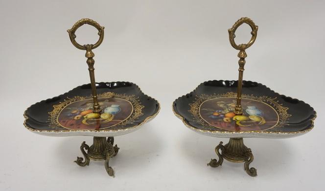 PAIR OF CENTER HANDLED SERVERS IN BRASS HOLDERS (1 of 2)