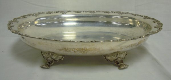 LARGE FOOTED SILVER PLATED SERVING BOWL; HAS RELI