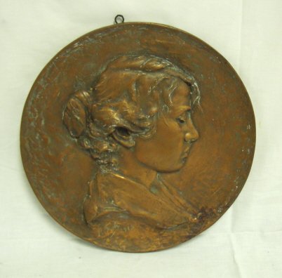 WALL PLAQUE BY P. TESTI, 1918; PROFILE OF A WOMAN