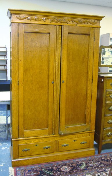 OAK 2 DR, 2 DRW ARMIORE; HAS INTERIOR SHELVES; 81