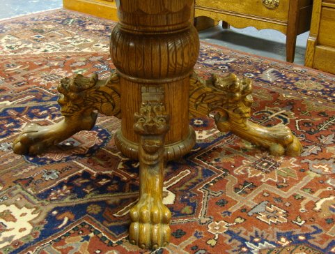 CLAW FOOT ROUND OAK TABLE W/LION HEADS; 48 IN, 30 - 2