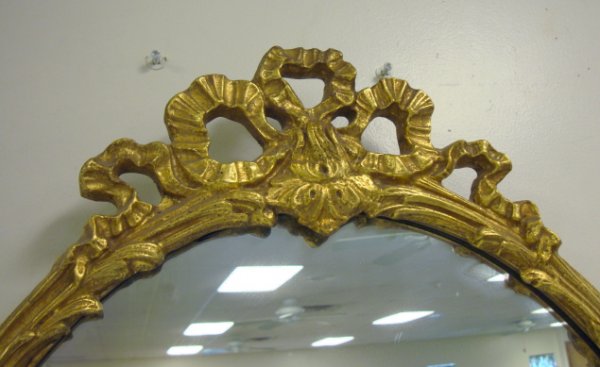 OVAL MIRROR IN GILT FLORAL FRAME W/BOW CREST; OVE - 2