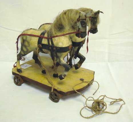 CARVED WOODEN 2 HORSE PULL TOY; 9 IN L, 6 1/4 IN