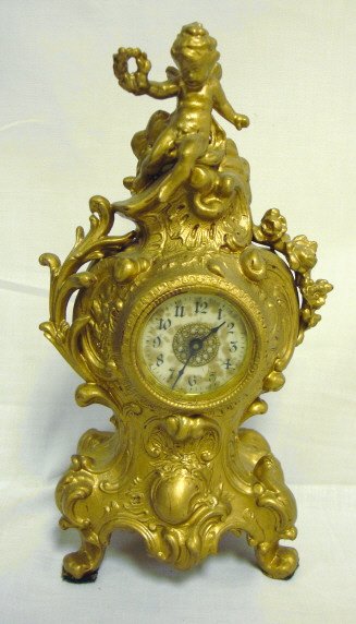 GILT METAL VICTORIAN DRESSER CLOCK; CHERUB ON TOP