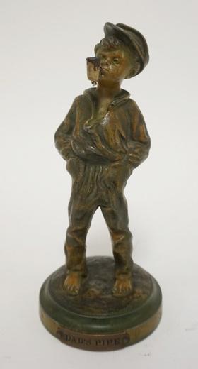 METAL FIGURE OF A BOY *DADS PIPE* (1 of 3)