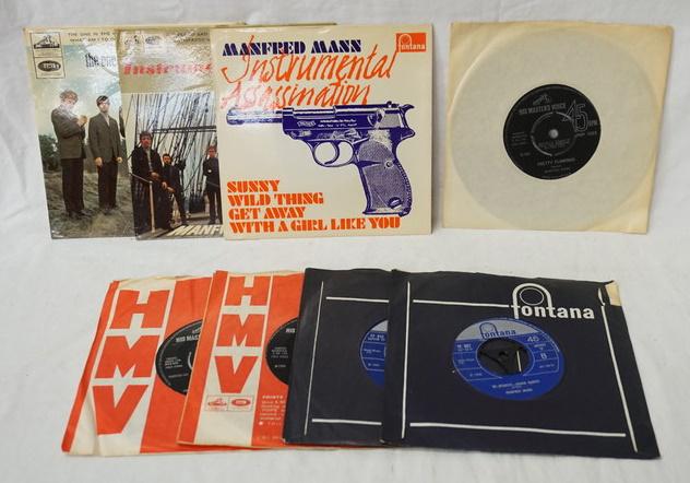LOT OF 5 MANFRED MANN 45S & 3 E.PS: LOT OF FIVE BRITISH MANFRED MANN 45S & THREE E.PS; INSTRUMENTAL ASSASSINATION, INSTRUMENTAL ASYLUM & THE ONE IN THE MIDDLE. ALL BUT ONE ARE IN ORIGINAL SLEEVE