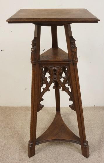 GOTHIC CARVED OAK PEDESTAL: GOTHIC CARVED OAK PEDESTAL, HAS PRAYING FIGURES CARVED ON THE LEGS, TOP IS 13 IN X 18 IN, 43 3/4 IN HIGH