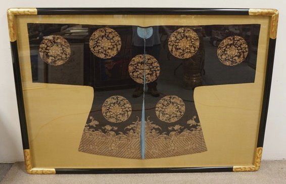 CHINESE WOMANS FRONT OPENING SURCOAT W/GOLD THREAD: CHINESE WOMANS FRONT OPENING 3/4 LENGTH SURCOAT OF MIDNIGHT BLUE SILK, SATIN DECORATED W/12 ROUNDELS DISPLAYING A PEONY FLOWER W/PAIRS OF STYLIZED CIACADAS & THE 8 BUDDHIST SYMBOLS, THE SURCOAT HAS A 