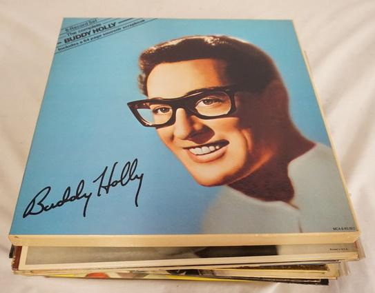 LOT OF 26 BUDDY HOLLY ALBUMS: LOT OF 26 BUDDY HOLLY ALBUMS; THE COMPLETE BUDDY HOLLY (BOXSET COMES W/ SIX RECORDS PLUS BOOK) SELF TITLED (THREE COPIES) BUDDY HOLLY FOR THE FIRST TIME ANYWHERE, THE COMPLETE CRICKETS, THE *CHIRPING*
