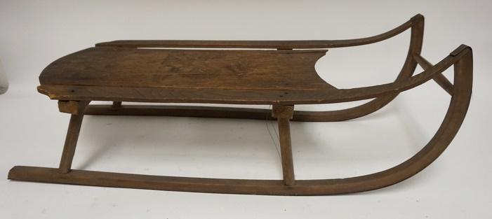 ANTIQUE SMALL CHILDS SLED: ANTIQUE SMALL CHILDS SLED W/LION DESIGN ON MAIN BOARD, 31 IN LONG