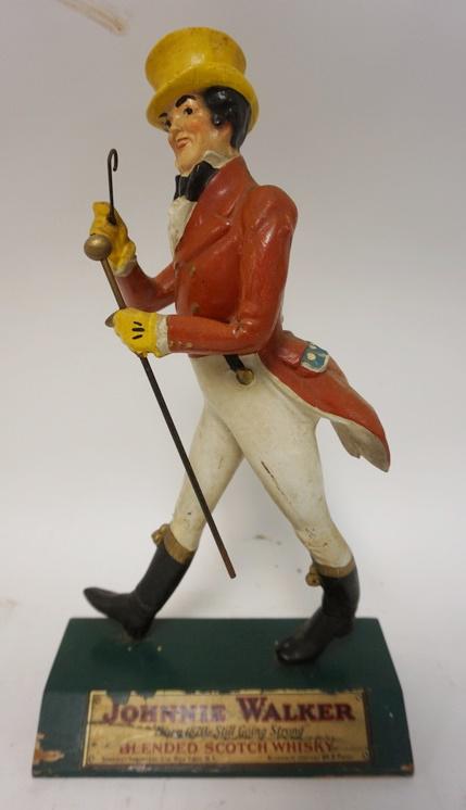 JOHNNY WALKER ADVERTISING FIGURE: JOHNNY WALKER ADVERTISING FIGURE, 14 1/2 IN HIGH X 8 1/8 IN WIDE