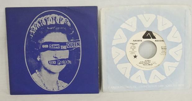 LOT OF 2 45S THE SEX PISTOLS/PATTI SMITH: LOT OF TWO 45S; THE SEX PISTOLS GOD SAVE THE QUEEN & PATTI SMITH GLORIA (PROMOTIONAL COPY)