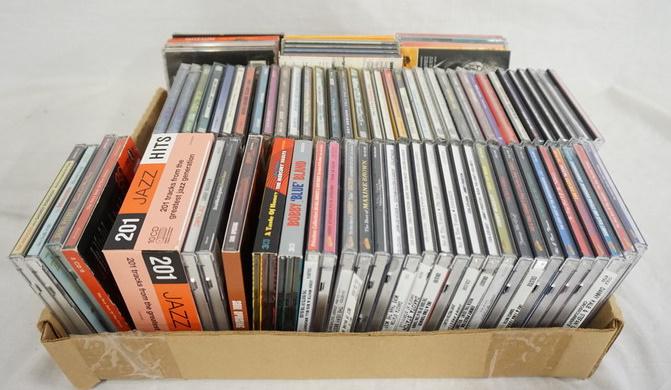 LOT OF CDS VARIOUS BANDS/ARTISTS: LOT OF CDS VARIOUS BANDS/ARTISTS INCLUDING; JOE DESIRE, BURL IVES, ROY ORBINSON, LOUIS ARMSTRONG, THE BLOSSOMS, PATSY CLINE, HORACE SILVER, FATS DOMINO BUDDY HOLLY & MANY MORE!
