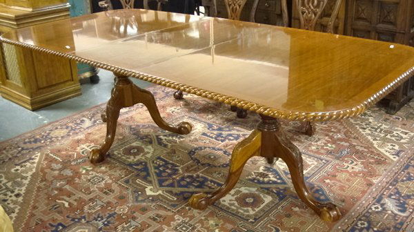 BALL & CLAW FOOT BANDED MAHOGANY DINING TABLE; RO: BALL & CLAW FOOT BANDED MAHOGANY DINING TABLE; ROPE TURNED EDGE W/LEAF; 46 IN X 75 IN CLOSED; LEAF IS 20 IN; 30 1/4 IN H
