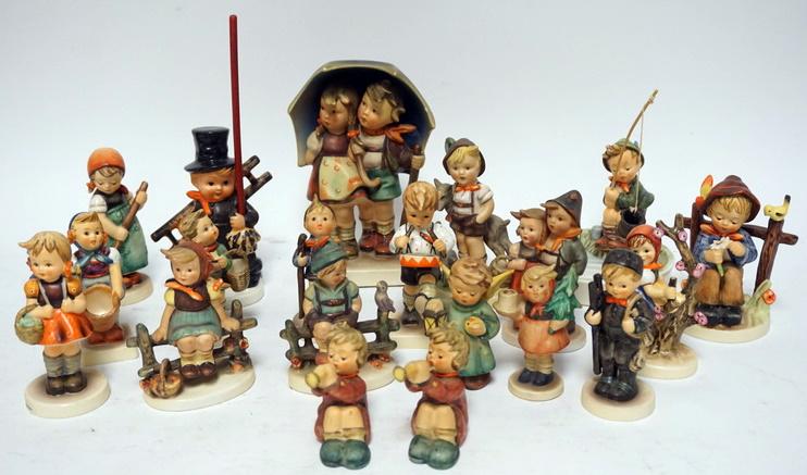 LOT OF 20 HUMMELS: LOT OF 20 HUMMELS STORMY WEATHER HAS REPAIR ON THE UMBRELLA & IS 7 IN H