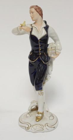 ROYAL DUX PORCELAIN FIGURE: ROYAL DUX PORCELAIN FIGURE MAN WITH A BIRD ON HIS HAND 10 3/4 IN H