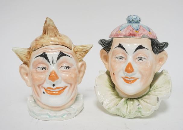 2 CLOWN TABACCO JARS: TWO CLOWN TOBACCO JARS BOTH HAVE CHIPS TALLEST 8 IN