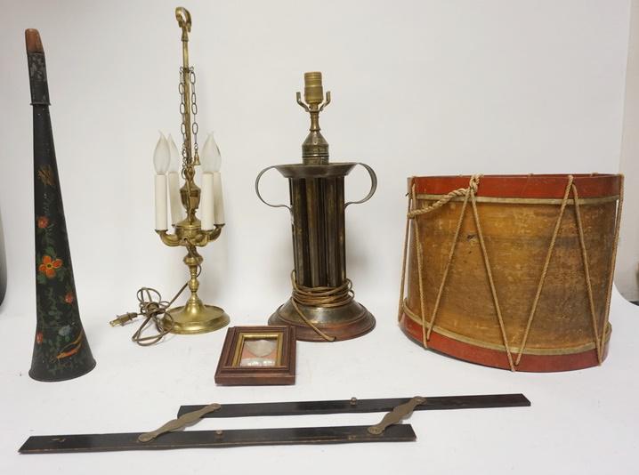 6 PIECE LOT W/ LAMPS HORN DRUM ETC.: SIX PIECE LOT W/ LAMPS HORN DRUM ETC. LOT INCLUDES A BRASS CANDLE STYLE LAMP 23 1/2 IN H, A LAMP MADE FROM A CANDLE MOLD AND DRUM W/ ONE DAMAGED END SHELLS IN A WALNUT FRAME & A DRAFTING TOOL.