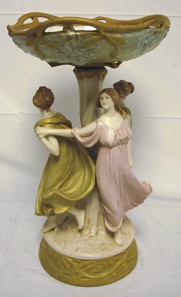 LARGE ROYAL DUX COMPOTE W/3 LADIES DANCING AROUND: LARGE ROYAL DUX COMPOTE W/3 LADIES DANCING AROUND THE BASE; TOP IS A SEPARATE PIECE; 20 1/4 IN H, APPROX 11 1/2 IN TOP DIA