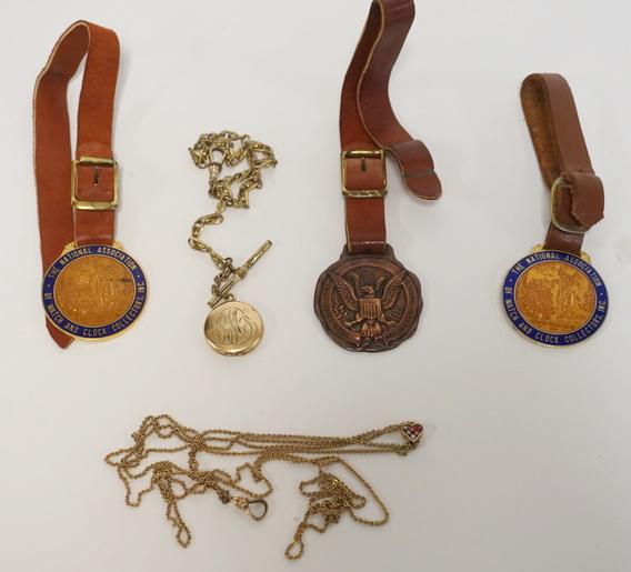 LOT OF WATCH FOBS AND CHAINS: LOT OF WATCH FOBS AND CHAINS INCLUDING 2 NATIONAL ASSOCIATION OF WATCH AND CLOCK COLLECTORS, STANDARD VARNISH WORKS AND 2 GOLD FILLED CHAINS, 1 WITH A LOCKET