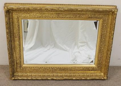 ANTIQUE GILT FRAMED BEVELLED EDGE MIRROR: ANTIQUE GILT FRAMED BEVELLED EDGE MIRROR, SOME LOSSES TO FRAME, 41 IN X 31 1/2 IN, 29 1/4 IN X 19 IN W/OUT FRAME