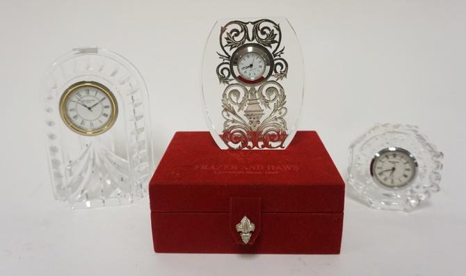 3 CRYSTAL CLOCKS-ONE W/STERLING SILVER: 3 CRYSTAL CLOCKS-ONE W/STERLING SILVER, 2 ARE WATERFORD, ONE IS FRAZER & HAWS IN ORIGINAL BOX, TALLEST IS 5 IN