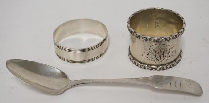 2 STERLING SILVER NAPKIN RINGS & A SIGNED COIN TEASPOON: 2 STERLING SILVER NAPKIN RINGS & A SIGNED COIN TEASPOON, 1.9 TROY OZ