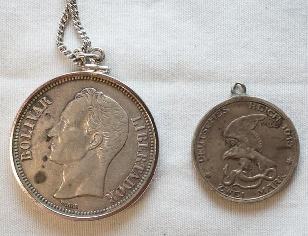 TWO 900 SILVER COIN PENDANTS (1 of 2)
