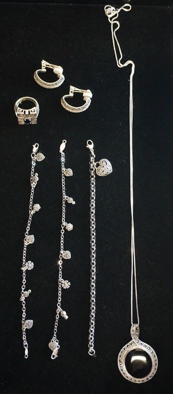 LOT OF STERLING SILVER & MARCASITE JEWELRY: LOT OF STERLING SILVER & MARCASITE JEWELRY; THREE BRACELETS, A NECKLACE, A PAIR OF EARRINGS & A RING. COMBINED WEIGHT INCLUDING STONES IS 2.565 TOY OUNCES