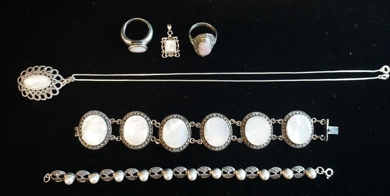 LOT OF STERLING SILVER JEWELRY: LOT OF STERLING SILVER JEWELRY; A MARCASITE & PEARL TYPE BRACELET, A MARCASITE & WHITE OPALESCENT BRACELET, A MARCASITE & PINK OPALESCENT RING, A NECKLACE W/ A MARCASITE & WHITE OPALESCENT PENDANT, A 
