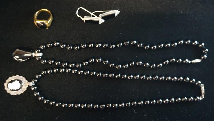 LOT OF STERLING SILVER & BLACK ONYX JEWELRY: LOT OF STERLING SILVER & BLACK ONYX JEWELRY; TWO NECKLACES ONE WITH A MARCASITE & CAMEO PENDANT, A PAIR OF EARRINGS & A RING