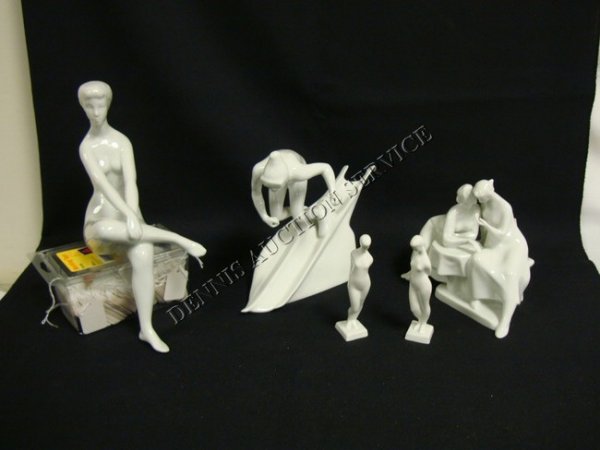 GROUP OF 5 WHITE ROYAL DUX PORCELAIN FIGURES: GROUP OF 5 WHITE ROYAL DUX PORCELAIN FIGURES; SEATED WOMAN (11 1/2 IN H), SKIER (11 IN L), 2 WOMEN AT A TABLE (7 IN W) & 2 SMALL NUDES (5 IN H)