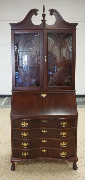 JASPER CABINET COMPANY MAHOGANY SECRETARY: JASPER CABINET COMPANY MAHOGANY SECRETARY HAS A SERPENTINE FRONT 34 1/2 IN W 83 IN H