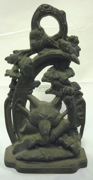 CAST IRON FOX DOORSTOP; 11 1/4 IN H, 6 IN W: CAST IRON FOX DOORSTOP; 11 1/4 IN H, 6 IN W