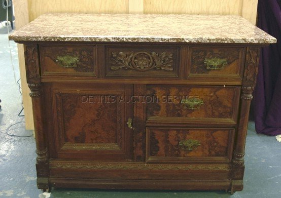 CARVED, VICTORIAN HOTEL WASHSTAND W/BROWN MARBLE : CARVED, VICTORIAN HOTEL WASHSTAND W/BROWN MARBLE TOP; HAS BURL PANELS; ONE PC OF MOLDING MISSING FROM 1 DRW; 40 1/4 IN W, 30 IN H, 22 1/4 IN D