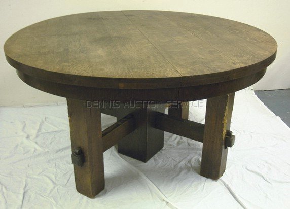 54 IN STICKLEY ROUND OAK TABLE; CHEWING DAMAGE ON: 54 IN STICKLEY ROUND OAK TABLE; CHEWING DAMAGE ON THE LEGS; 29 IN H