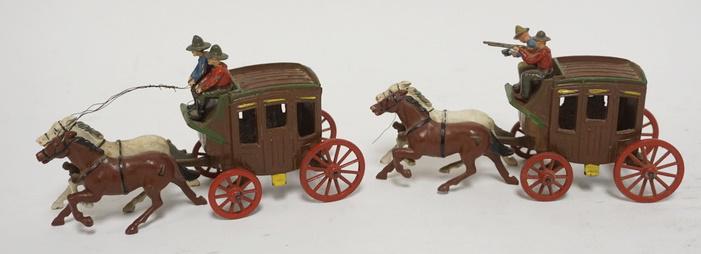GROUP 2 ANTIQUE CAST METAL STAGECOACH TOYS: TWO CAST METAL STAGECOACH TOYS W/ DRIVERS & SHOT GUN RIDERS. 6 3/4 IN L