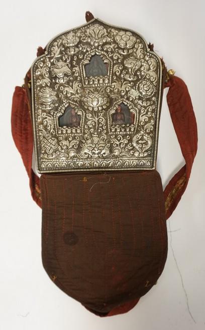 BUDDHIST RELIGIOUS ARTIFACT W/ SILVER COVER: BUDDHIST RELIGIOUS ARTIFACT W/ SILVER COVER IN AN EMBROIDERED CASE 7 IN X 9 1/2 IN 3 1/2 IN DEEP