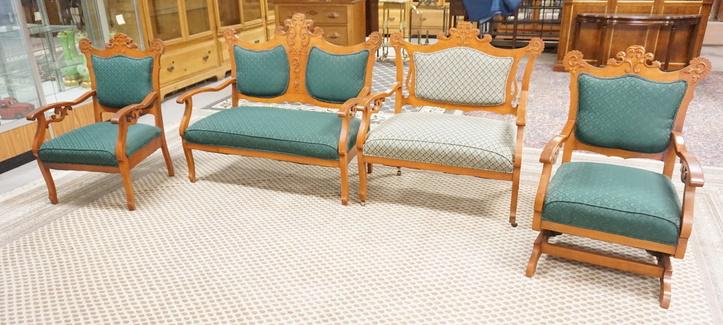 4 PIECE CARVED VICTORIAN PARLOR SUITE: FOUR PIECE CARVED VICTORIAN PALOR SUITE W/ LOVE SEAT, EXTRA WIDE CHAIR, PLATFORM ROCKER & AN ARM CHIAR. LOVE SEAT IS 47 1/4 IN W