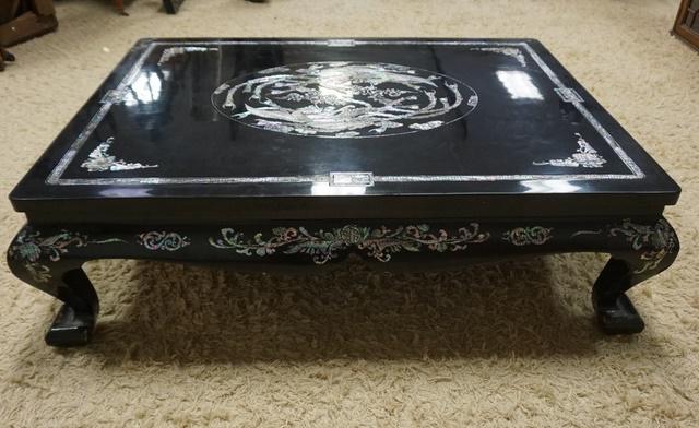 BLACK LACQUER MOTHER OF PEARL INLAID COFFEE TABLE: BLACK LACQUER MOTHER OF PEARL COFFEE TABLE TOP IS 47 1/2 IN X 35 3/4 IN 15 IN H