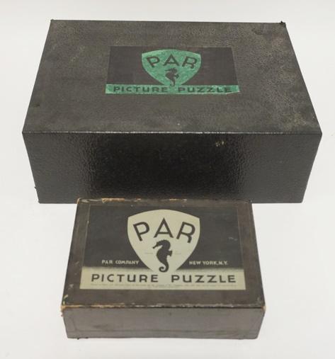 LOT OF 2 PAR PITCURE WOOD JIGSAW PUZZLES IN ORG BOXES: LOT OF TWO PAR PICTURE WOOD JIGSAW PUZZLES IN ORIGINAL BOXES; *THE INTERLOPER* & *NEW MEXICO ADVENTURE* NUMBER OF PIECES IS UNCERTIAN